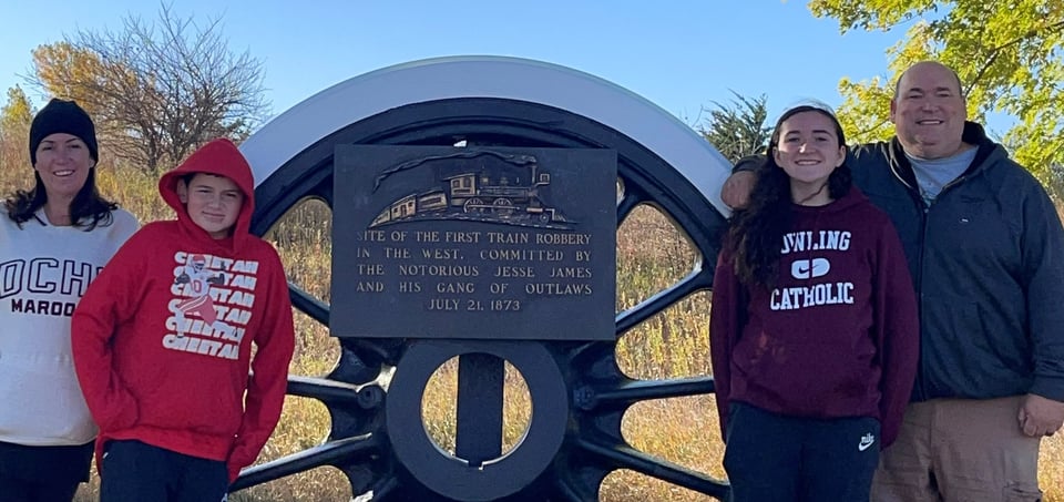 Team member, family survive fire;